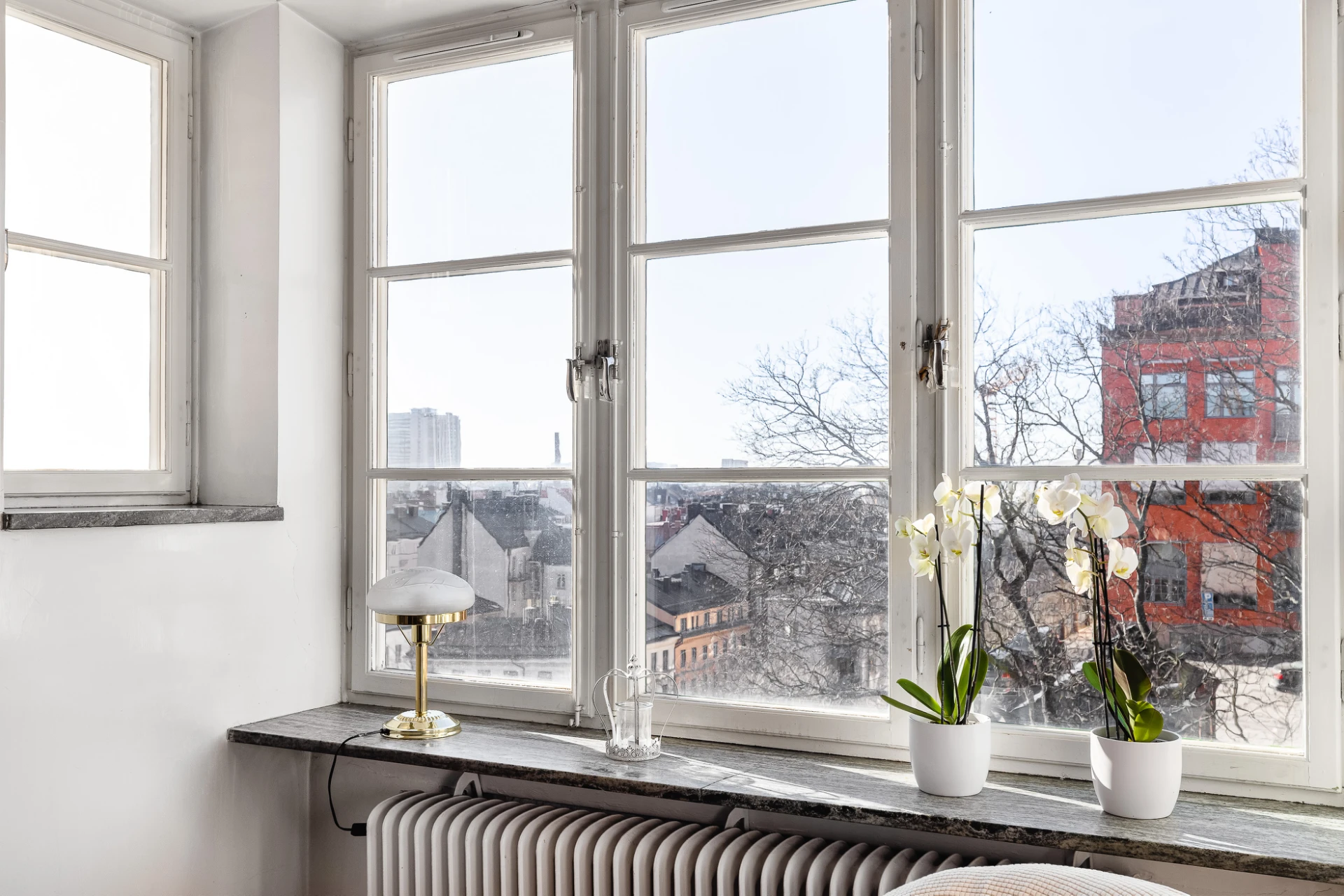 Burspråk med spröjsade fönster