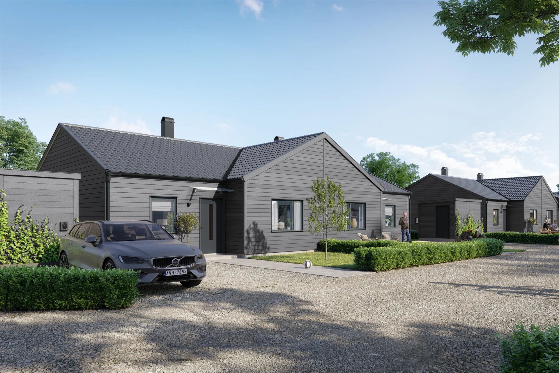Husen sett från gata - plats för två bilar på de flesta husen